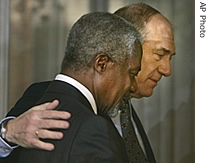 Israeli Prime Minister Ehud Olmert, right, and U.N Secretary-General Kofi Annan leave a a href=