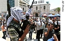 Palestinians react as members of the Al Aqsa a href=