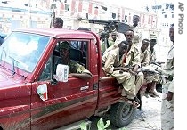 Somali Transitional Federal Soldiers with an anti aircraft gun mounted on the a href=