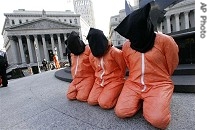 Protesters dressed as Guantanamo detainees demonstrate in front of Manhattan a href=